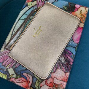 KATE SPADE light pink metallic safiano zippered wristlet.
